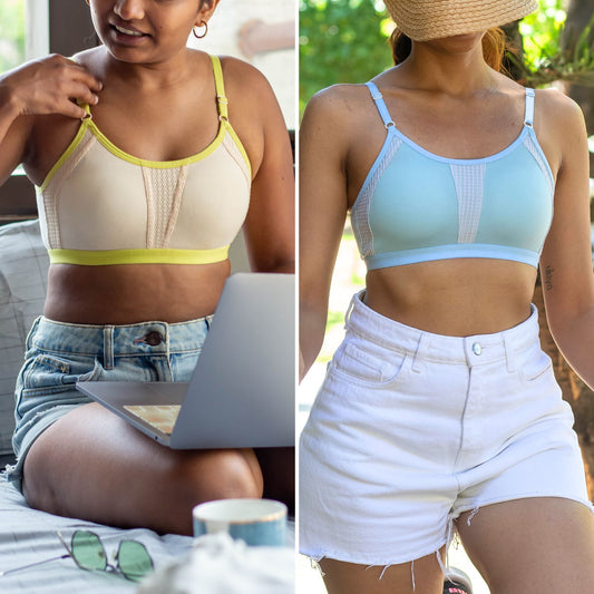 A side-by-side comparison of two women wearing wireless sports bra-style crop tops. The left model wears a beige BAE bra with bright yellow trim while sitting and using a laptop.