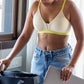 Qiwion Mood Youth Bra in a cream and neon colour. Padded, non-wired bra with adjustable straps