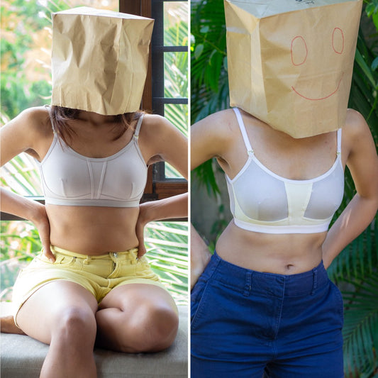 Two images of a person wearing a paper bag over their head with a smiley face drawn on it, one in a white bra and yellow shorts, the other in a white bra and blue pants.